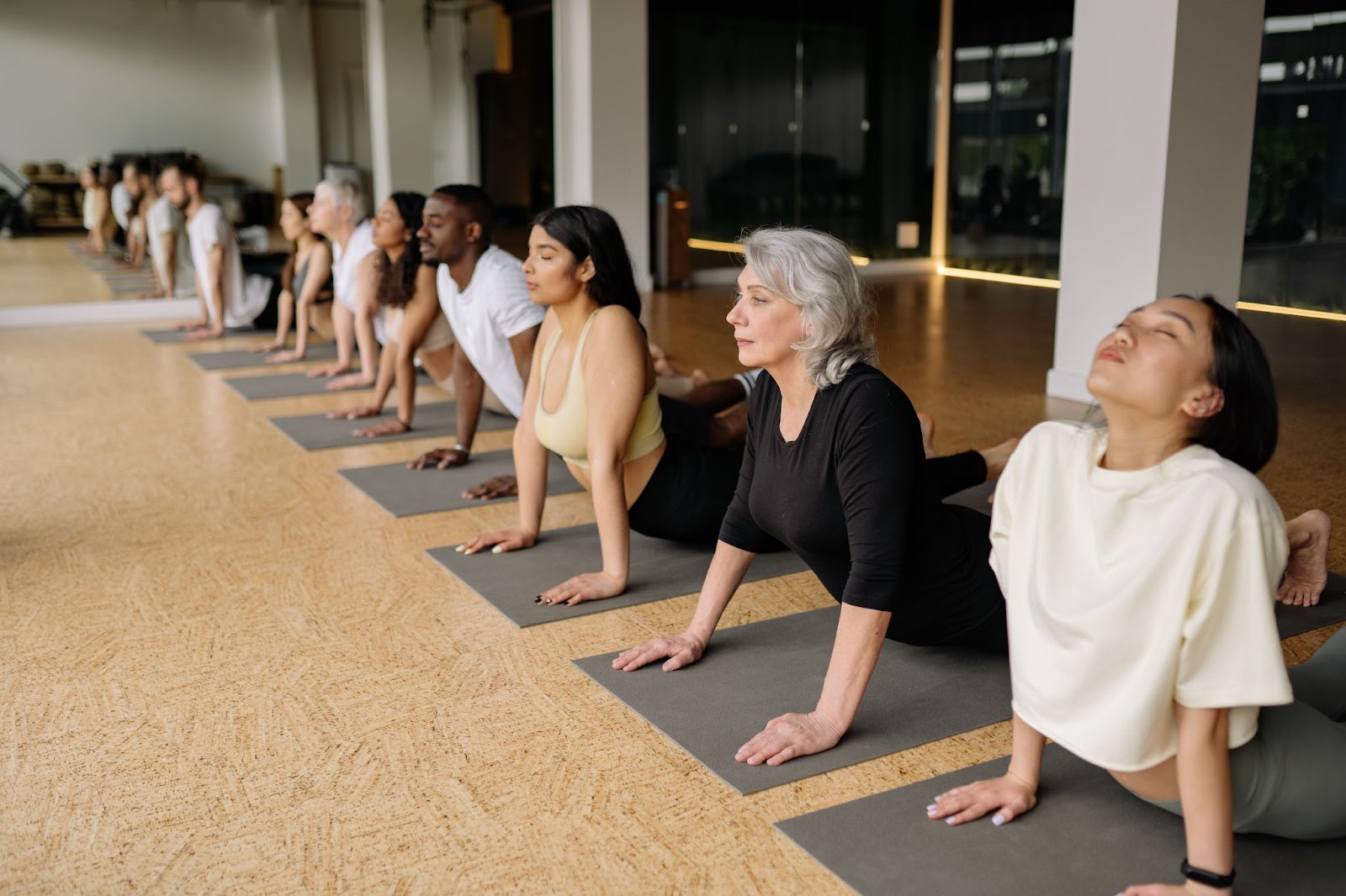 Employees participating in a company yoga class