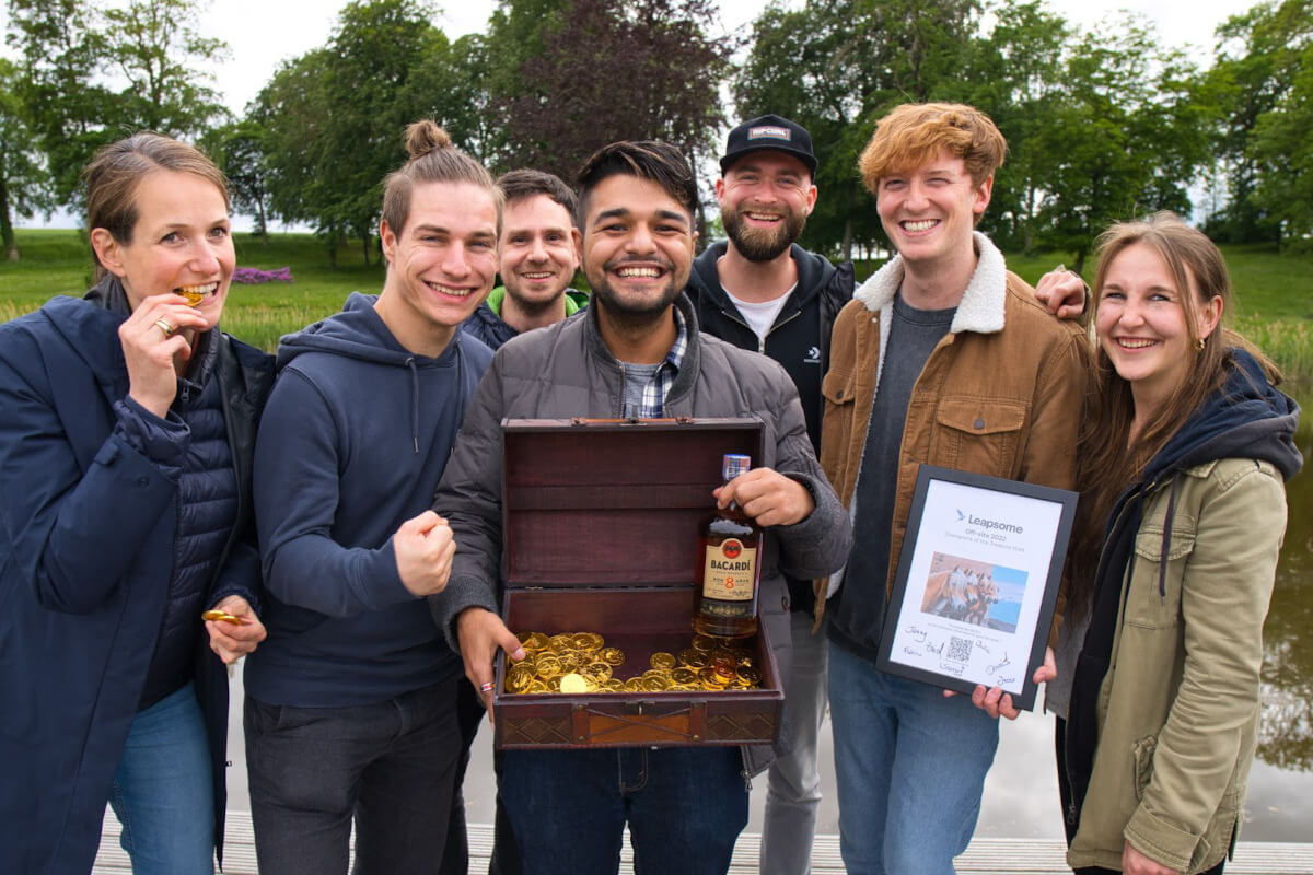 Photo of the joyful team of seven Leapsome employees that won the offsite treasure hunt