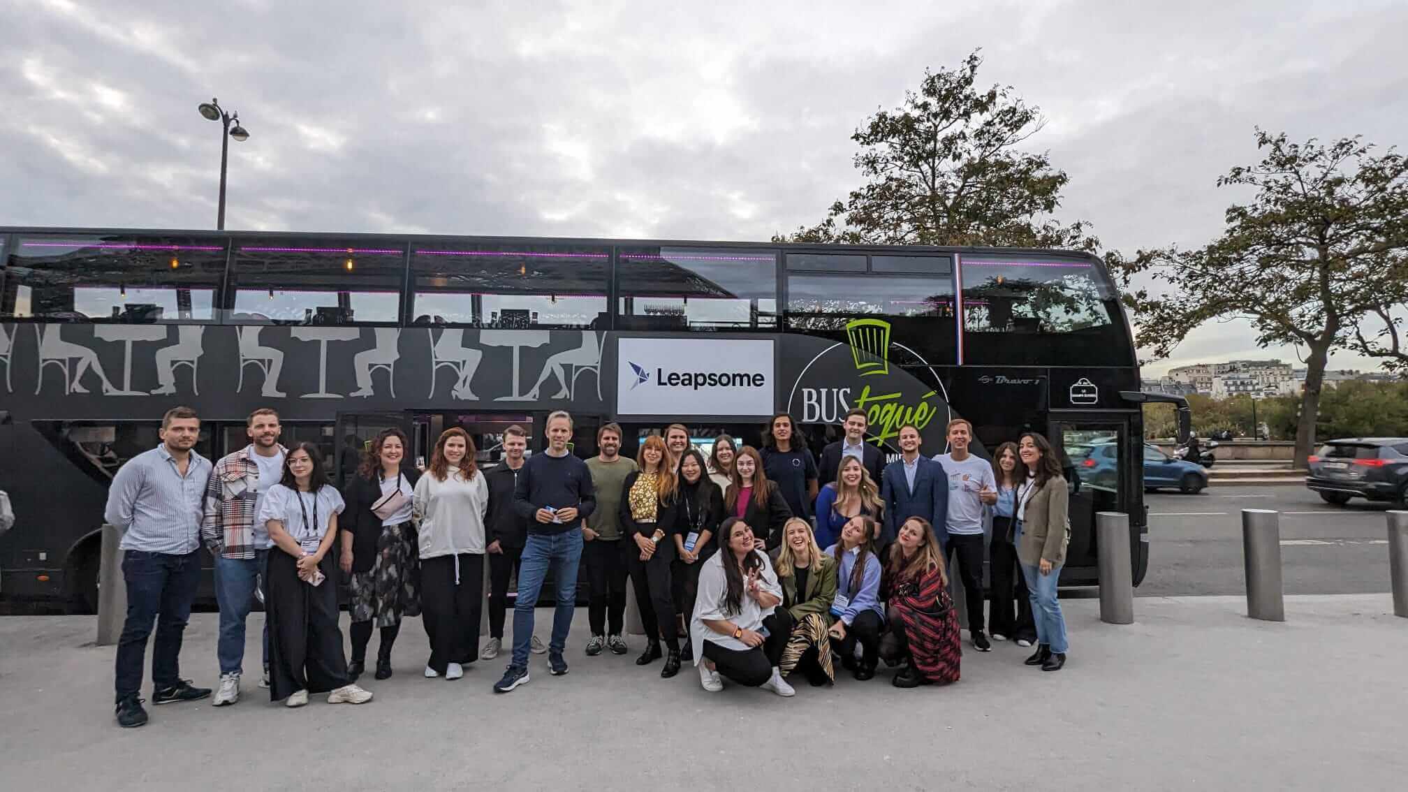 A group photo in front of the dining bus that took us through Paris